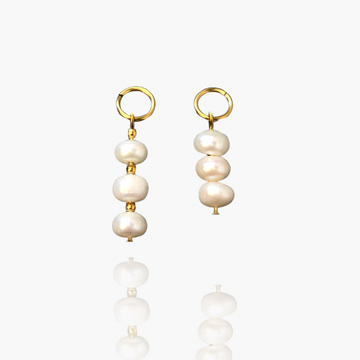 3 white buttons pearls
