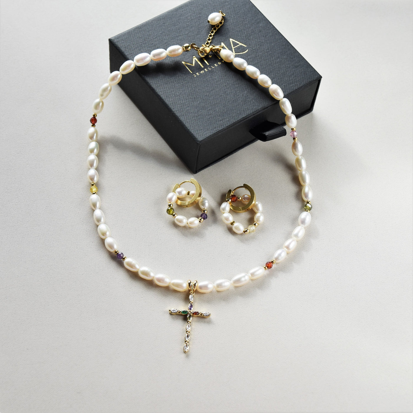 Pearl necklace with a cross